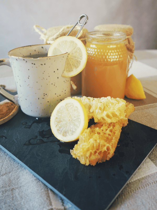 Our favorite recipe for drinking lemon water in the morning combines honey, lemon, and hot water. 