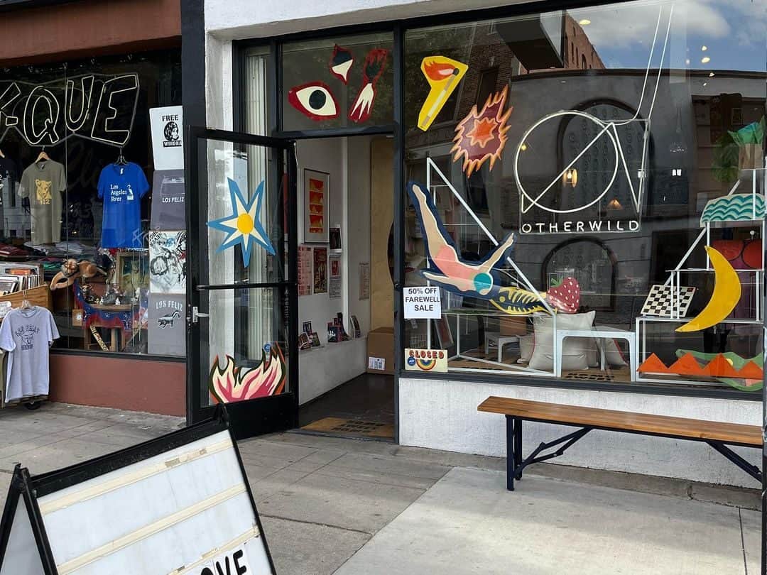 Otherwild's Silverlake storefront showcases a playful decor across the front windows with unrelated iconography. 