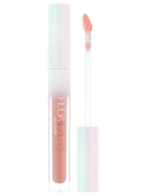 A safe bet for a makeup gift is a hydrating lip balm like this Huda Beauty product. 