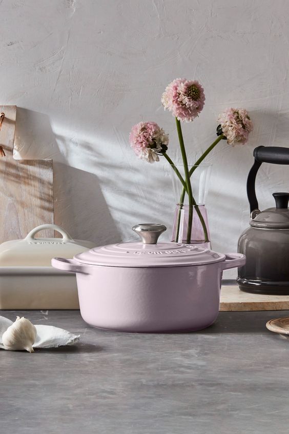 Le Creuset dutch oven in Shallot pink and a casserole dish in Merinque. 